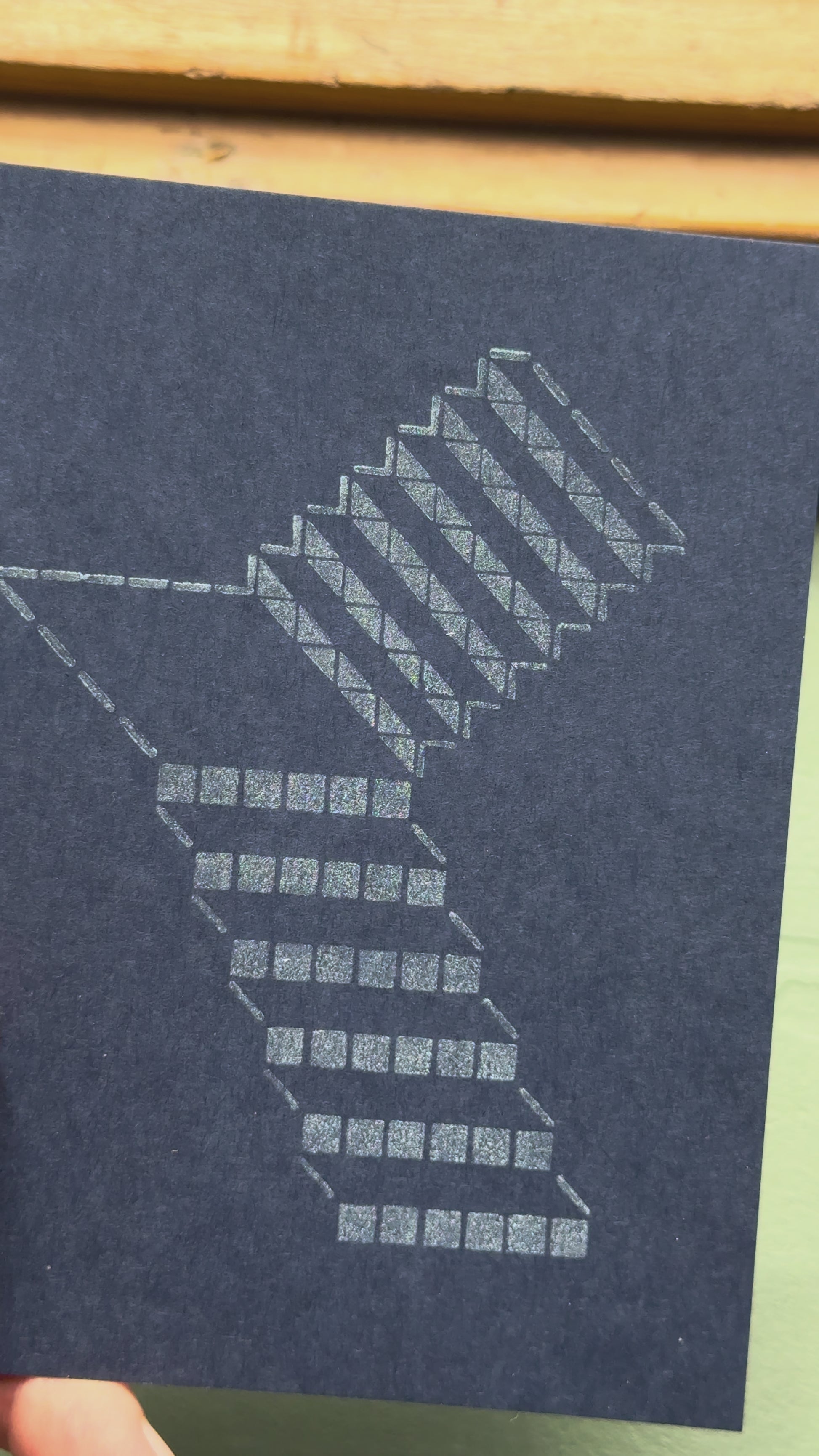 Print of a staircase on a piece of dark blue cardstock using Tsukineko Brilliance Platinum Planet ink