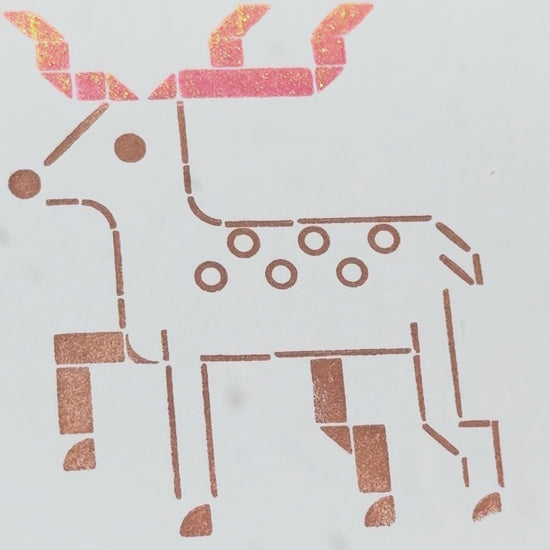 Print of a deer on a piece of white cardstock using Tsukineko Brilliance Rocket Red Gold and Coffee Bean ink colors
